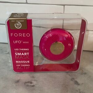 FOREO UFO Mini Facial Device in Fushia with Gold Accent
